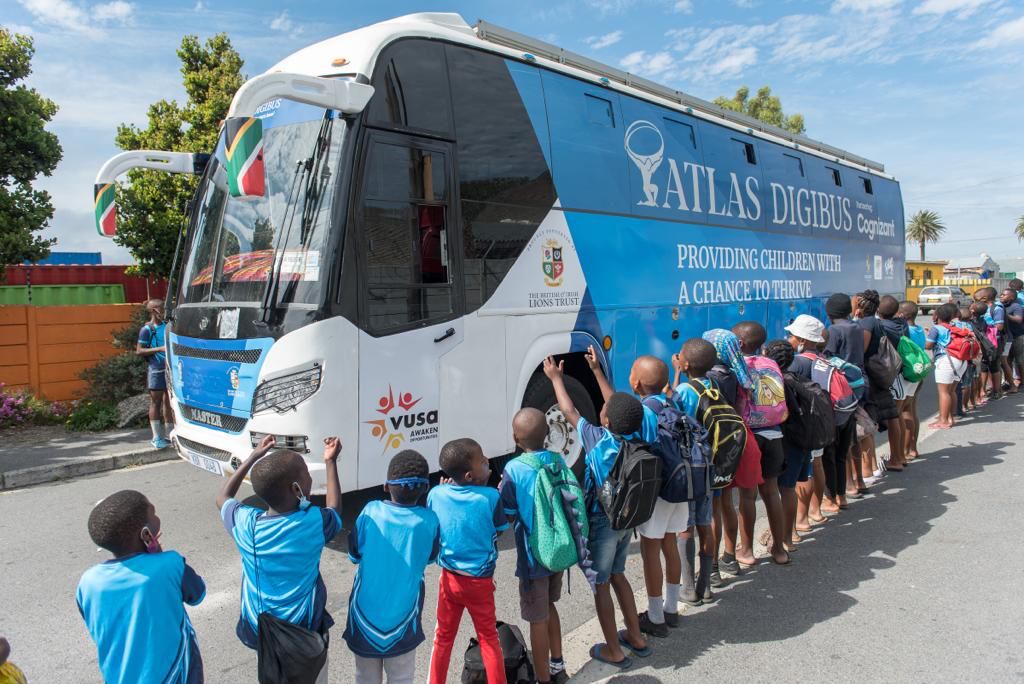 Children in Langa, Cape Town waiting outside the Atlas DigiBus