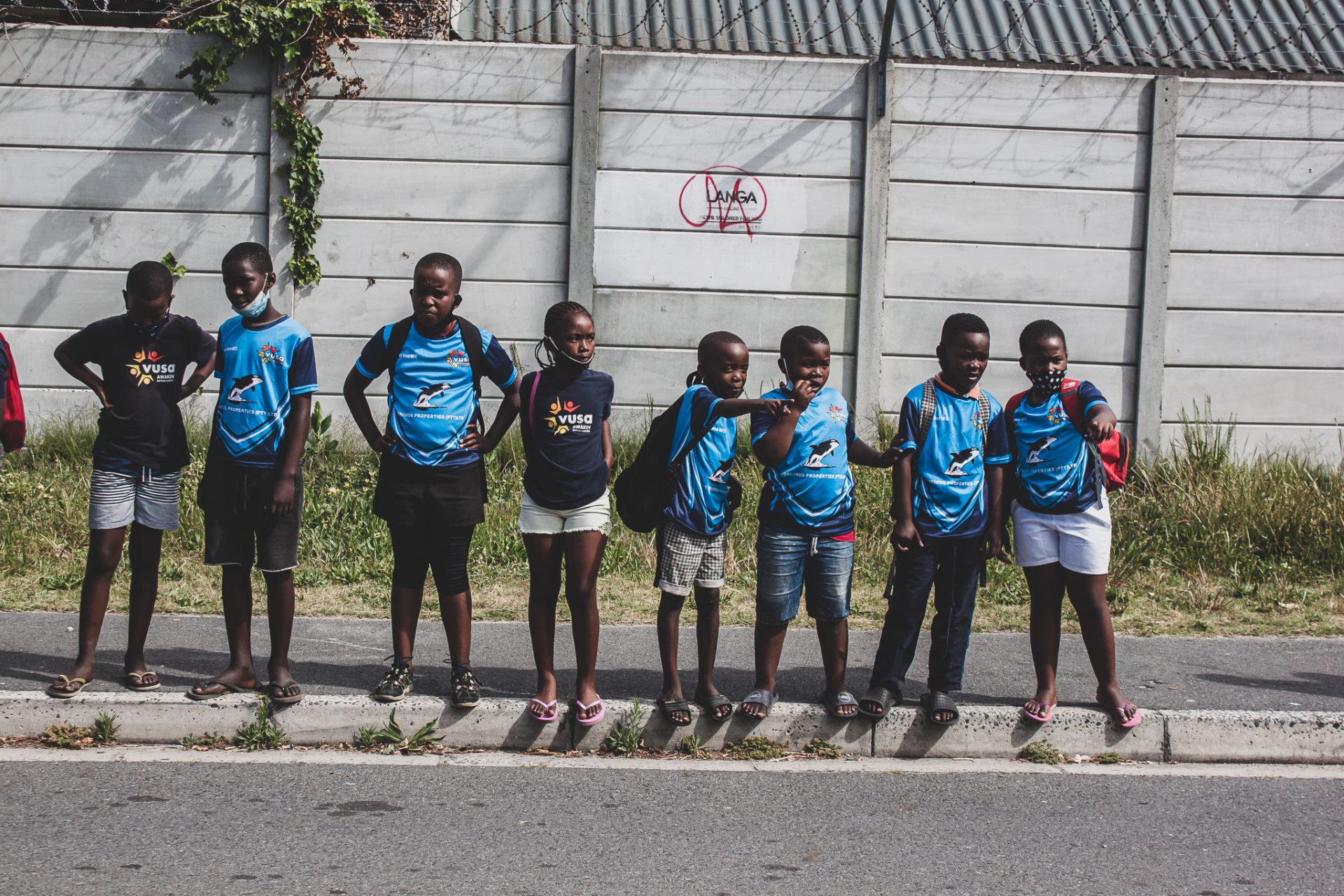 Children on the street waiting for lessons on the Atlas Digibus