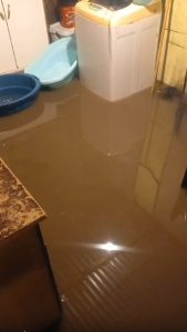 Flooding in a home in Masi & Ocean View