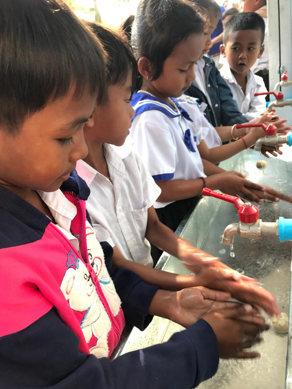 Children washing hands